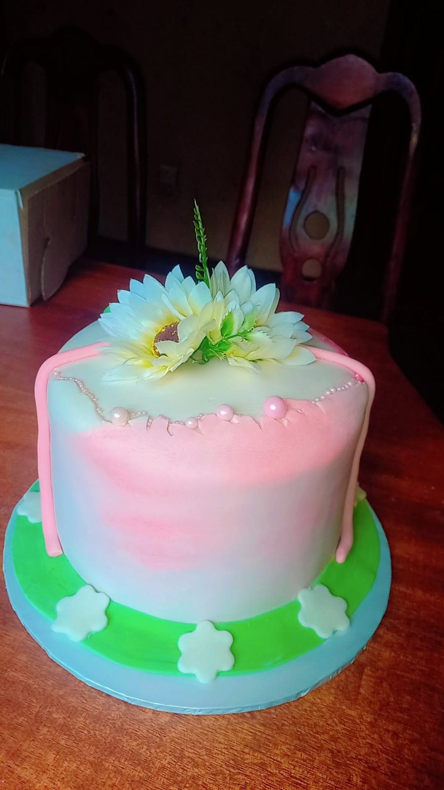 Pastel cake with fresh flowers