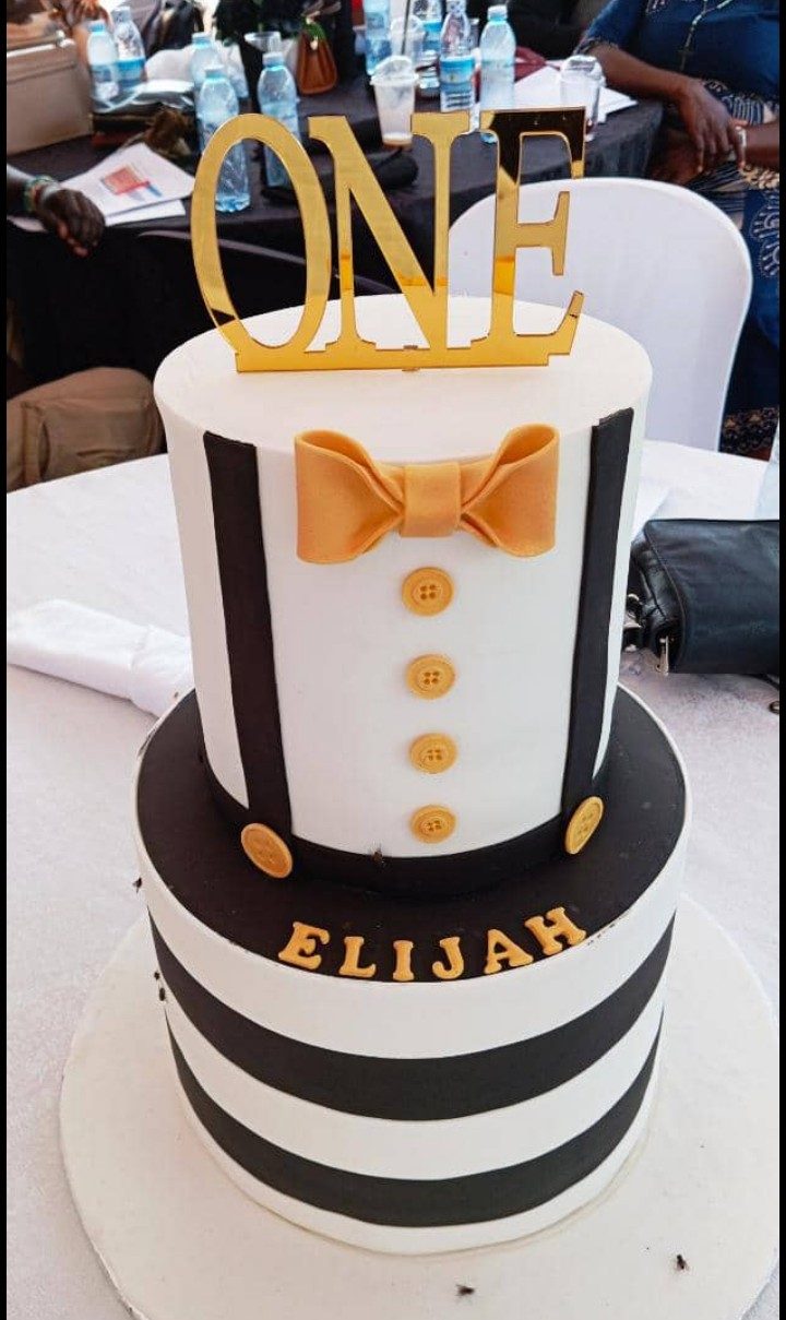 Tuxedo themed first-birthday cake for Elijah